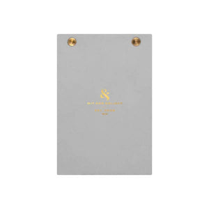 desktop notepad with grey and gold trim